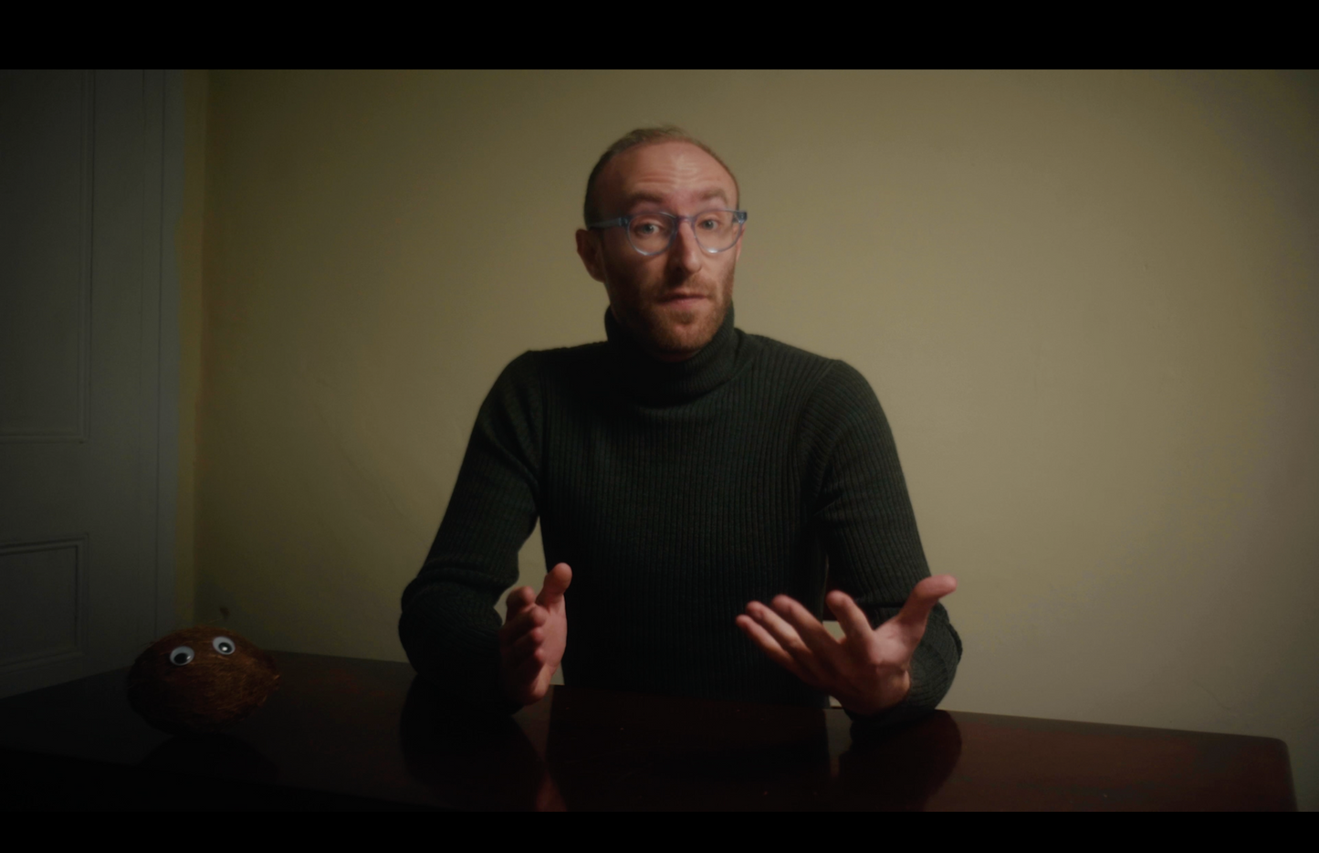 dark green turtleneck sweater